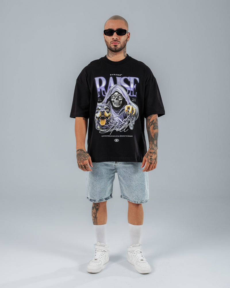 camiseta oversize negra estampada con calavera y perro rottweiler