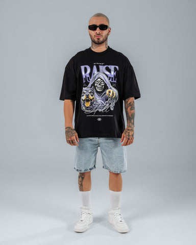 camiseta oversize negra estampada con calavera y perro rottweiler