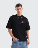 Camiseta Negra Boxy Travis Vision